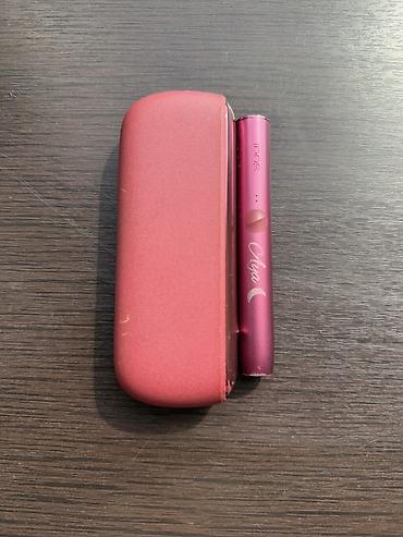 Məhsul: IQOS ILUMA cihazı və daşıma/şarj qutusu (rəng: tünd