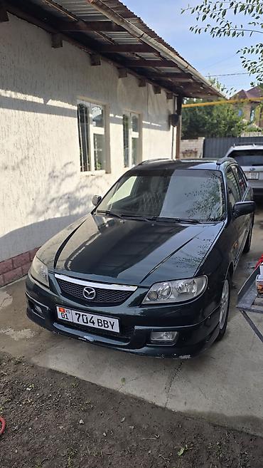 Mazda Familia: 2003 г., 1.6 л, Механика, Бензин, Универсал at lalafo.kg Mazda Familia: 2003 г., 1.6 л, Механика, Бензин, Универсал