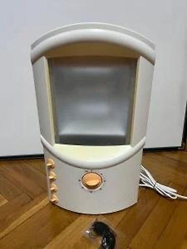 Ostali aparati za negu lica: Solarijum lampa za lice (kućni mini-facial tanner) Opis: - Kompaktna — 12