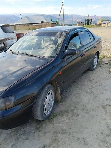 короми: Toyota Carina E: 1999 г., Бензин, Седан — 4