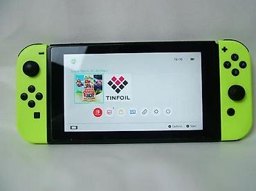 Nintendo Switch: Nintendo Switch, čipovana konzola u odličnom stanju. Čipovana — 15