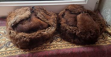 balıqcı geyimi: Tebii xezden hazirlanmis ushanka papaglar. Uzun muddet qiragda — 1