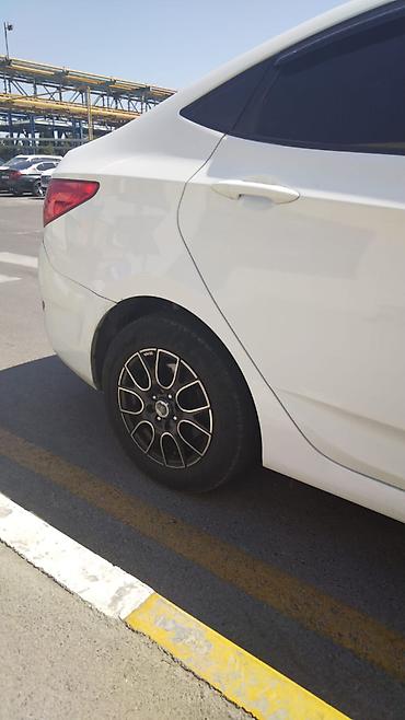 hunday accent 2012: Hyundai Accent: 1.6 l | 2014 il Sedan — 4
