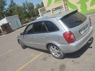 Унаа: Mazda 323: 2003 г., Кол менен иштөөчү, Бензин, Универсал — 9
