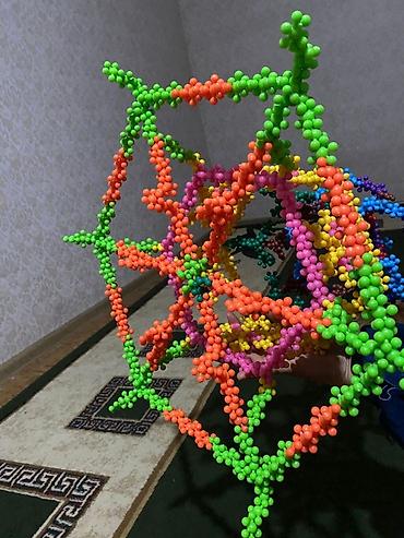 Модульные покрытия, пазлы: Конструктор «Снежинки» из разноцветных пластиковых деталей в одном — 12