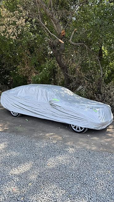 посадка машины: Авточехол (тент) для легкового автомобиля - Универсальный тент — 1