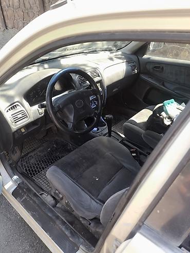2107 2011: Mazda 626: 1997 г., 2 л, Автомат, Бензин, Седан — 4