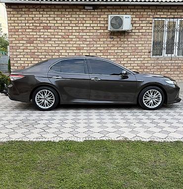 corolla 2018: Toyota Camry: 2019 г., 2.5 л, Автомат, Гибрид, Седан — 2