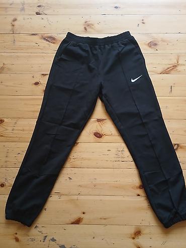 pant: Nike kişi idman şalvarı - Rəng: qara - Model: klassik jogging/track — 1
