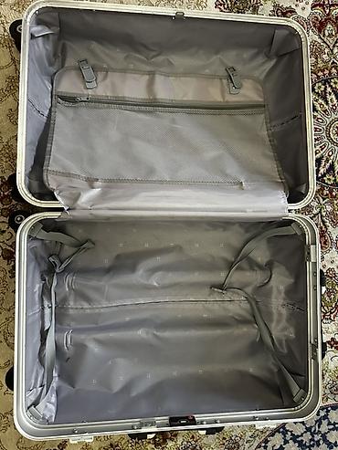 trolly bag: Чемодан на колёсах, цвет стальной синий. Особенности: - Прочный — 1