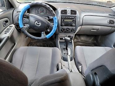 форд мондео 1 8: Mazda 323: 1999 г., 1.6 л, Автомат, Бензин, Хэтчбэк — 7