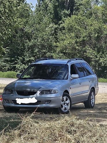 лад крузер: Mazda 626: 2001 г., 2 л, Механика, Бензин, Универсал — 1