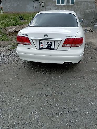 знаки: Mazda Capella: 2003 г., 2.5 л, Автомат, Бензин, Седан — 5