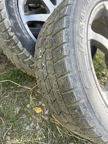 Комплект зимних шин на дисках. - Размер: 215/50 R17 91Q (указано на