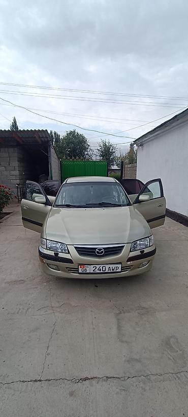 требуется тонар: Mazda Capella: 2000 г., 2 л, Автомат, Бензин, Седан — 1