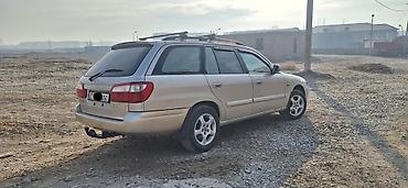 toyota sequi: Mazda Capella: 2000 г., 2 л, Механика, Бензин, Универсал — 4