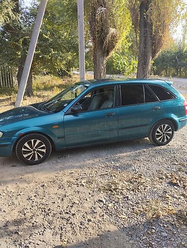 колпак на зил ммз: Mazda Familia: 1999 г., 1.6 л, Механика, Бензин, Универсал — 3