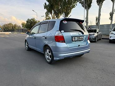 225 65 15: Honda Fit: 2002 г., 1.3 л, Вариатор, Бензин, Хэтчбэк — 5