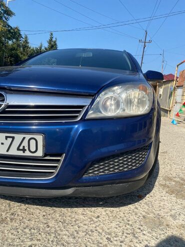 Opel: Opel Astra H Caravan (universal), göy rəng. - Kuzov: universal — 17