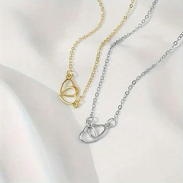 Ogrlice: Ogrlica sa dva isprepletena srca
1300 din — 8