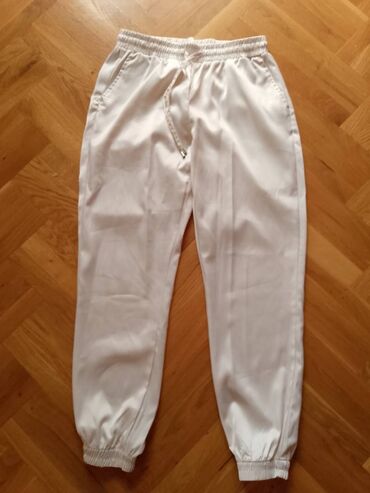 Kompleti: Set odeće – 3 komada 1) Bele sportske pantalone (Misu) - Materijal sa — 1