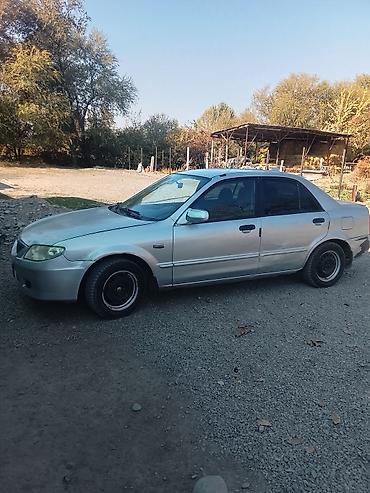 мазда 323 1999: Mazda 323: 2003 г., 1.3 л, Механика, Бензин, Седан — 1