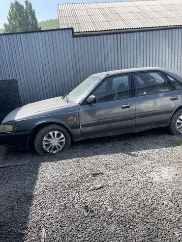 Mazda: Mazda 626: 1991 г., 2 л, Механика, Бензин, Седан