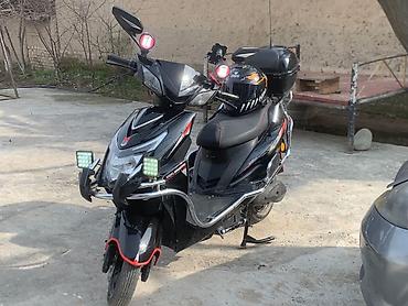 Скутеры: Скутер Skillmax, черный, с богатым комплектом освещения и туристским — 9