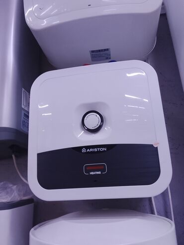 кран с нагревом воды: Электрический водонагреватель Ariston в белом корпусе с черной нижней