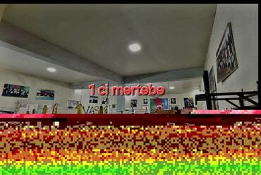 Binalar: Binə qəsəbəsində yerləşən “Vasaq” İdman Klubu və yanında ayrıca — 8