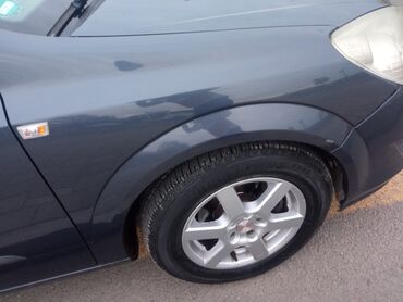 Opel: Opel Astra H – 5 qapılı hetçbek Xüsusiyyətlər: - Kuzov: tünd göy — 1