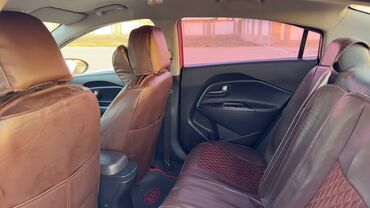 Kia: Kia Pride: 1.4 l | 2013 il Sedan — 14