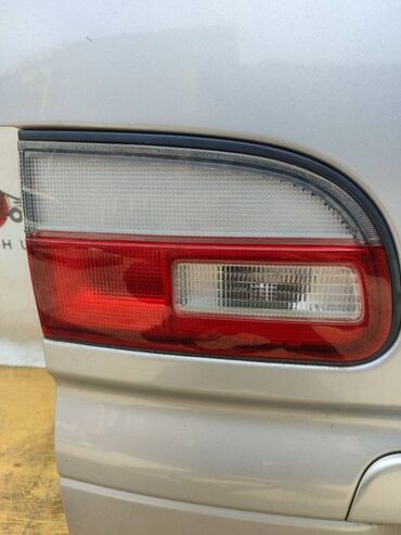 Другие детали электрики авто: Задний левый стоп-сигнал Mitsubishi