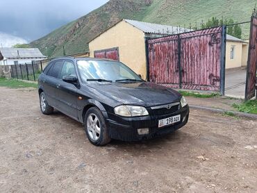 машина а 6: Mazda 323: 2002 г., 1.6 л, Механика, Бензин, Универсал