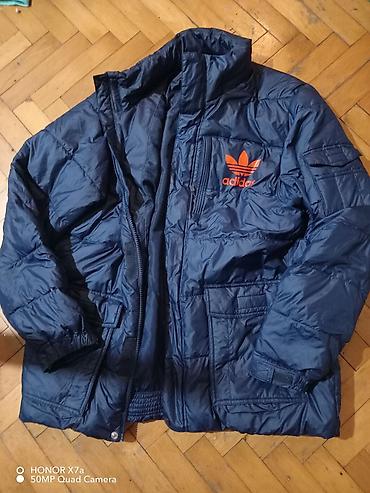 Adidas zimska jakna, veličina L. Tamno plava, prošivena i postavljena na lalafo.rs Adidas zimska jakna, veličina L. Tamno plava, prošivena i postavljena