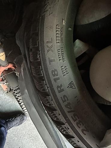 r18 235: Комплект зимних шин с шипами Continental - Размер: 235/45 R18 - — 4