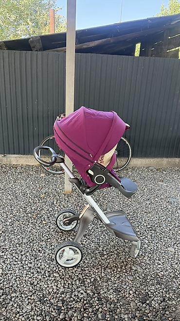 Детский мир: Детская прогулочная коляска Stokke Xplory (фиолетовый цвет) — 1