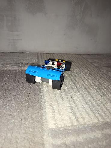 кукла купить: Конструктор LEGO Technic — полицейский гоночный автомобиль - Модель — 4