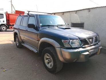 обшивка дверных карт: Nissan Patrol: 2002 г., Дизель, Внедорожник