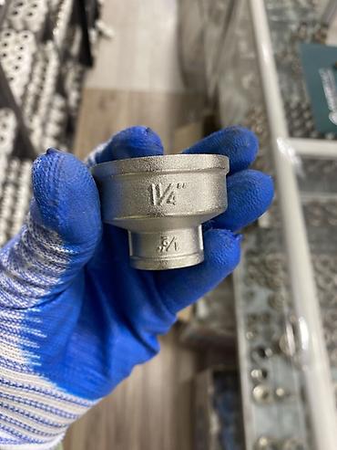 Переходная муфта 1 1/4" × 3/4" для трубопроводных соединений. Фитинг