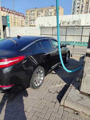 выхлоп на е34: Kia Optima: 2012 г., Автомат, Гибрид, Седан — 7