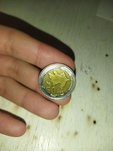 sikkə: Məhsul: 50 qəpik sikkə – zərb qüsurlu (Gəncə) Təsvir: - Azərbaycan — 2