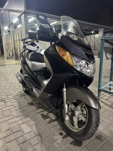 где можно купить мотоцикл: Скутер Suzuki Skywave 420 кубов, имеет большой передний обтекатель и