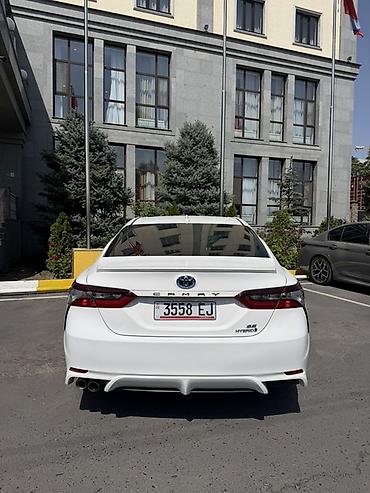 byd e6: Toyota Camry: 2023 г., 2.5 л, Автомат, Гибрид, Седан — 2