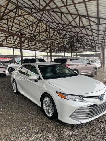 тику машина: Toyota Camry: 2018 г., 2.5 л, Автомат, Гибрид, Седан