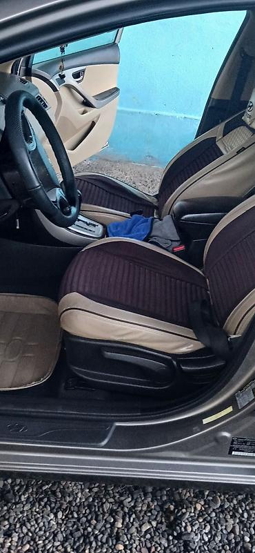 Hyundai: Hyundai Elantra: 1.8 l | 2011 il Sedan — 12
