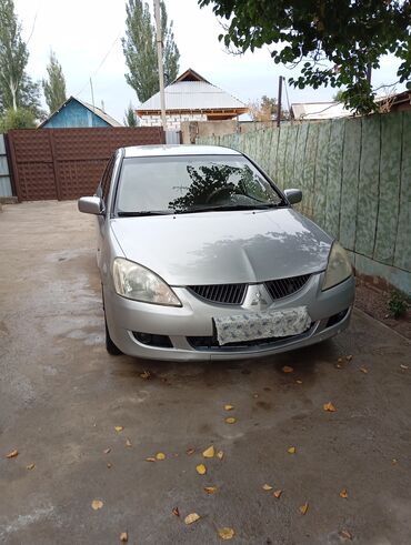 авто голф 2: Mitsubishi Lancer: 2004 г., 1.6 л, Автомат, Бензин, Седан