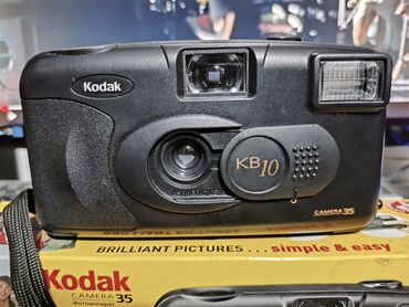 Фотоаппараты: Продаю плёночный фотоаппарат Kodak KB10 в новый. Состояние как с