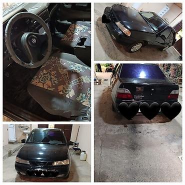 Nəqliyyat: Daewoo Nexia sedan - Kuzov: 4 qapılı sedan, qara rəng - Ban — 1
