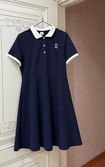 Tünd göy rəngli polo-stil don Qiymət və ölçü üçün əlaqə saxlayın -
